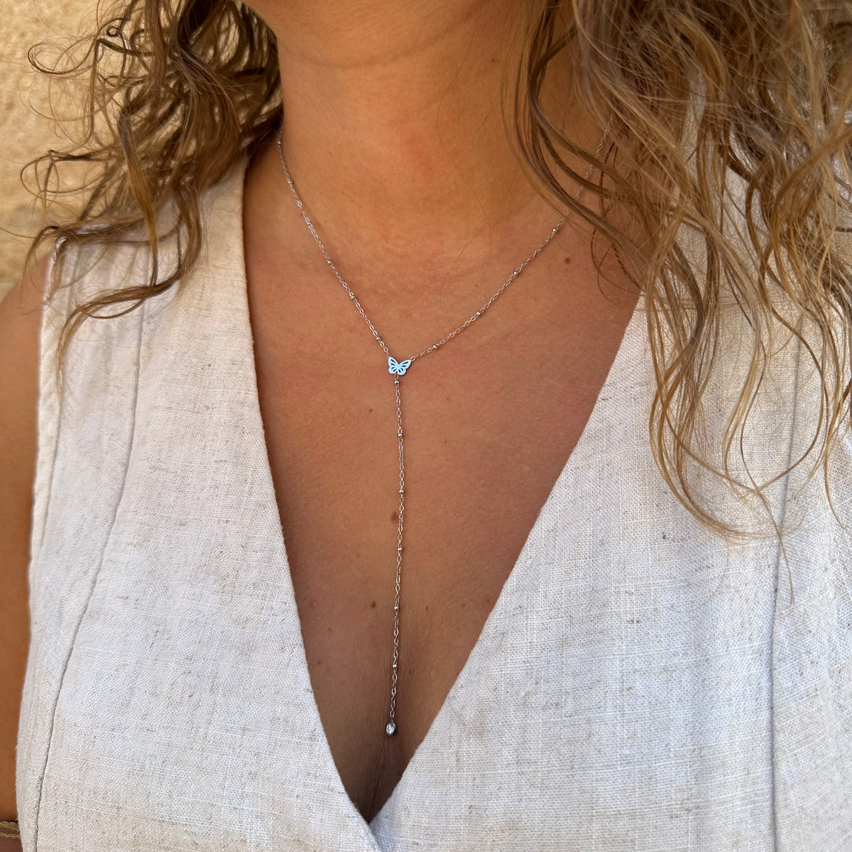 collier y cravate papillon acier inoxydable argenté minimaliste